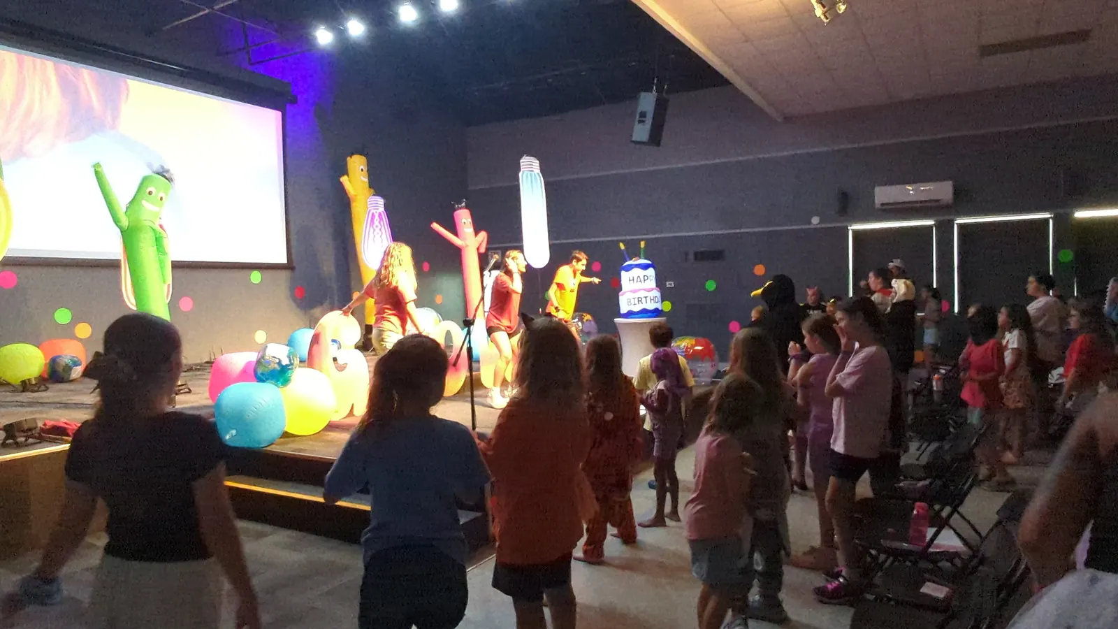 Campers singing along in chapel