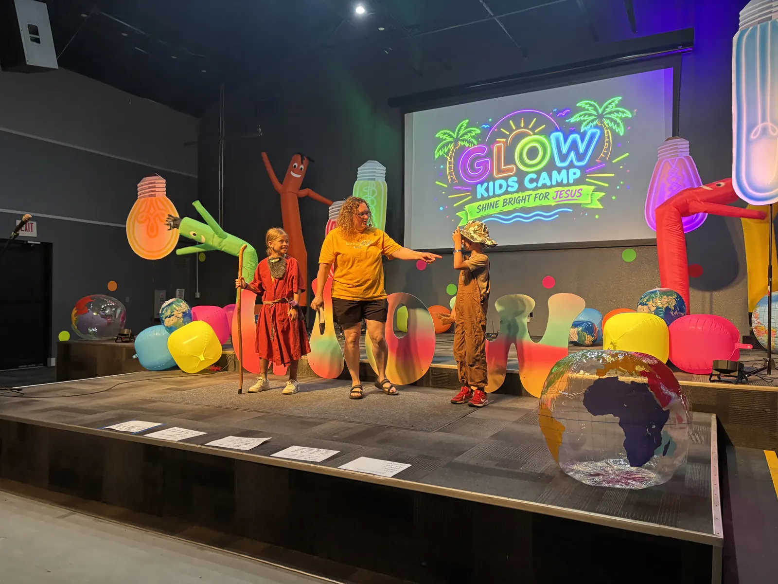 A costumed skit on the GLOW stage