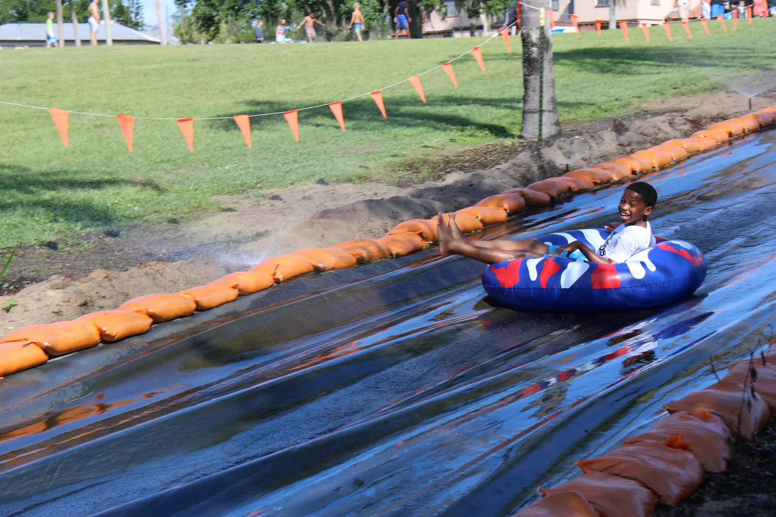 Tubing down the slip 'n slide