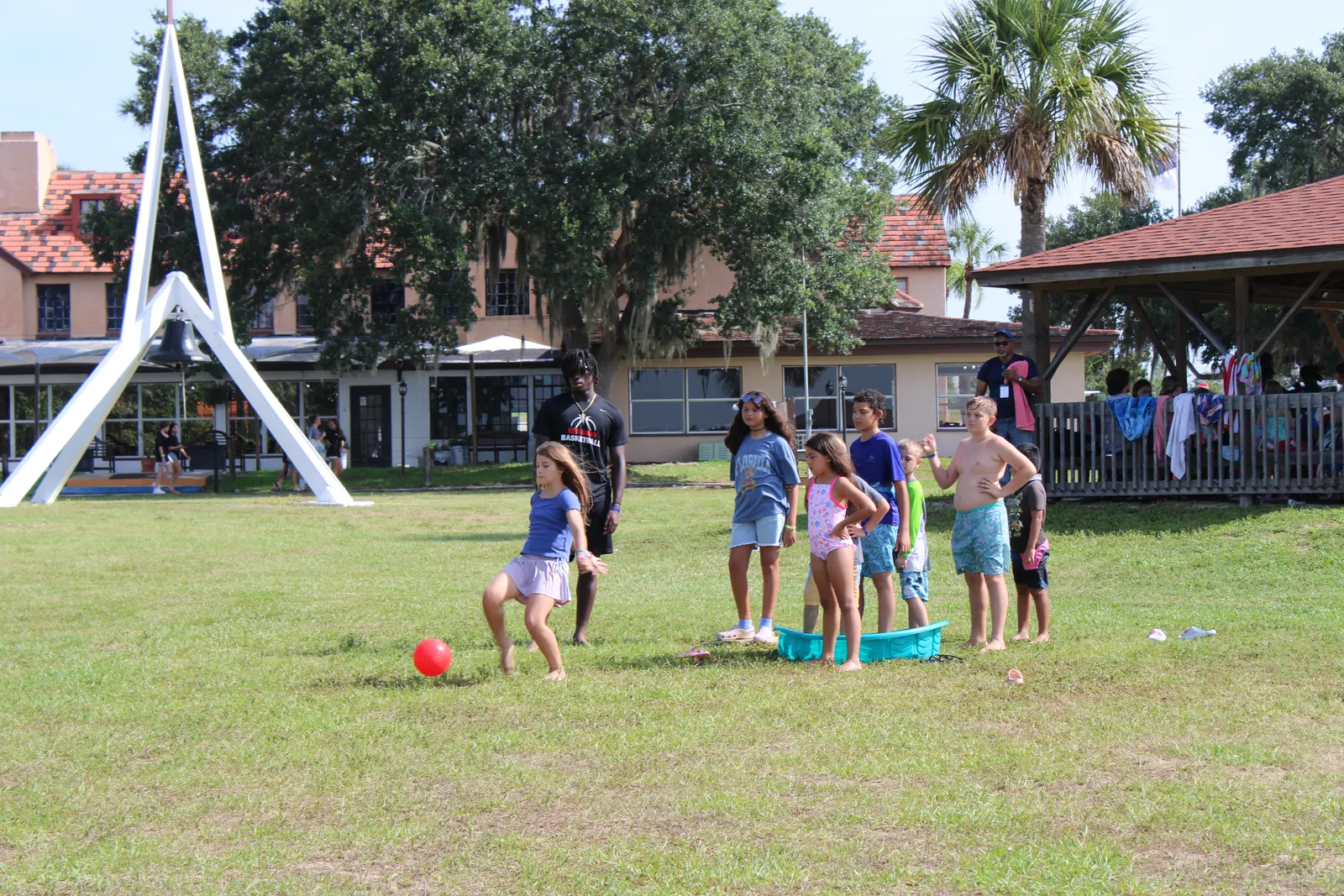 Campers playing ball on the camp field