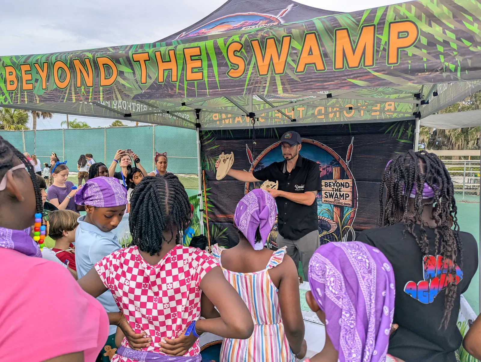 Campers watching the Beyond the Swamp animal show