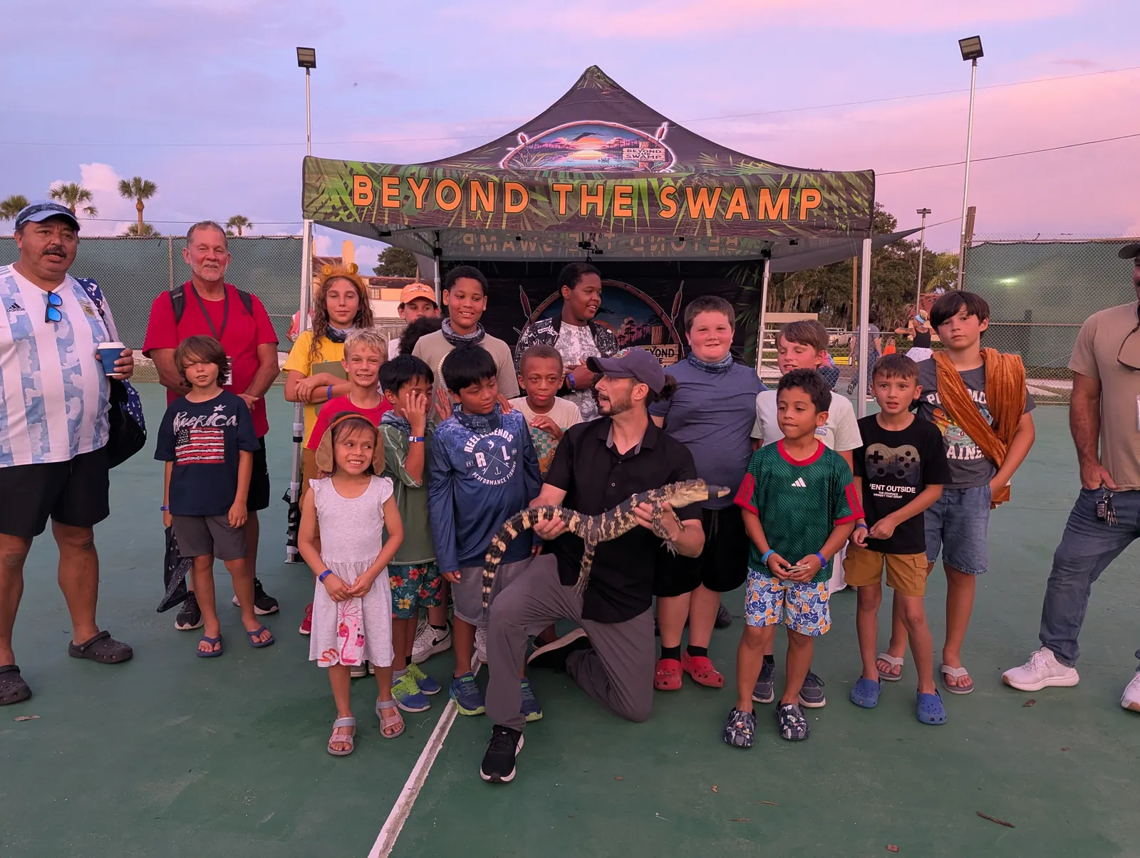 Campers posing with the animal show crew