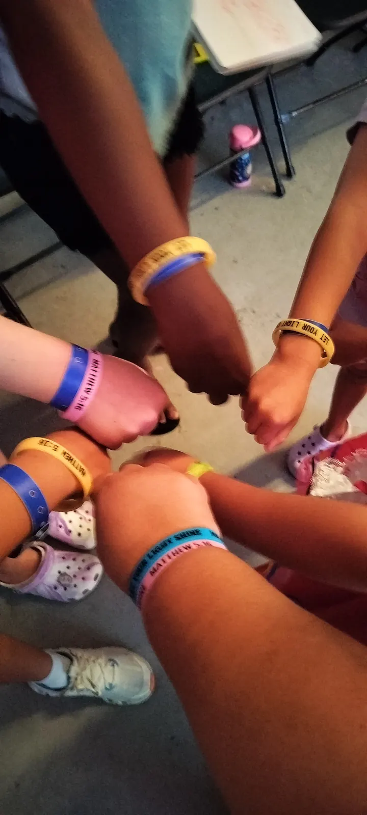 Campers comparing their camp bracelets