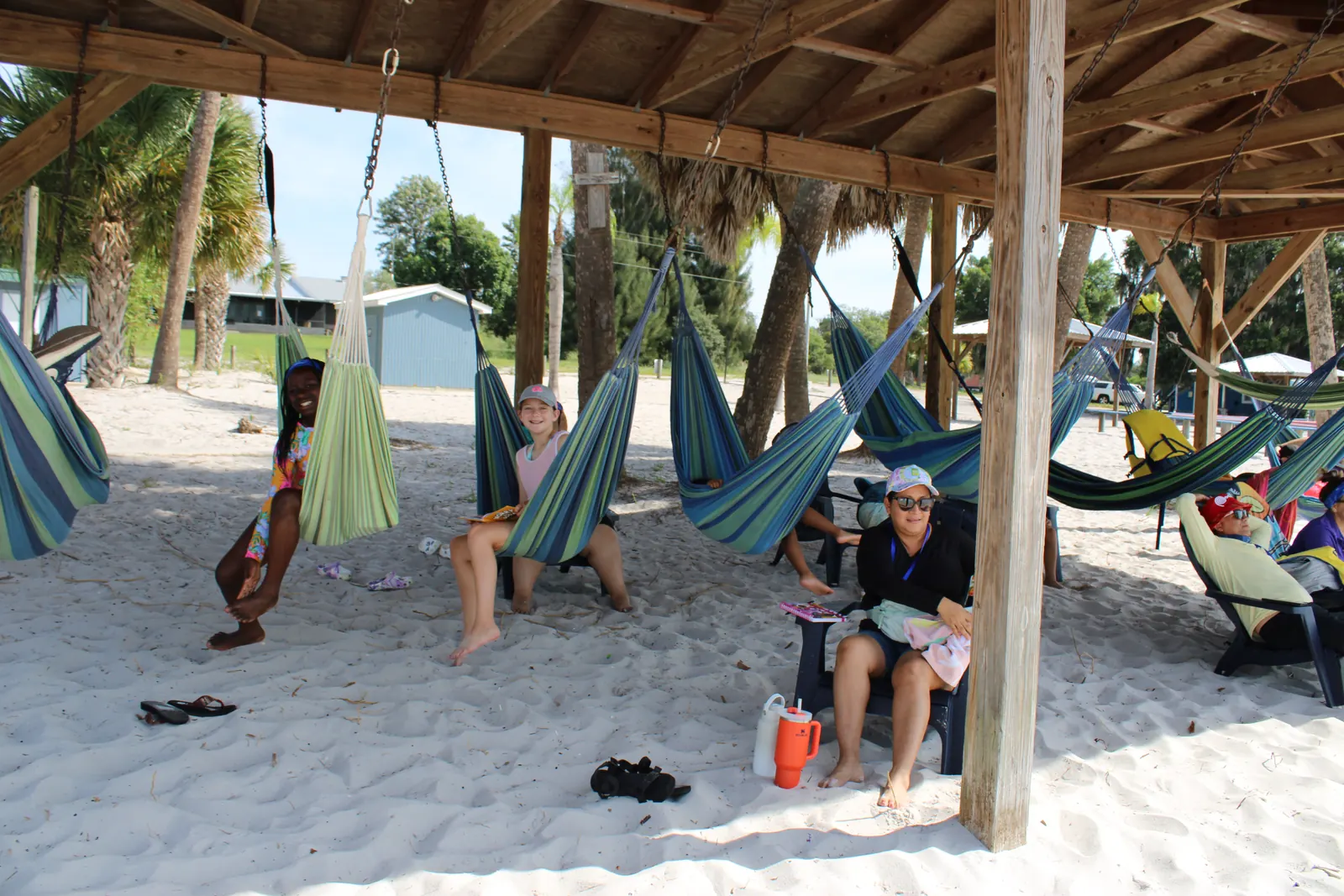 Hammocks strung up under the beach pavilion