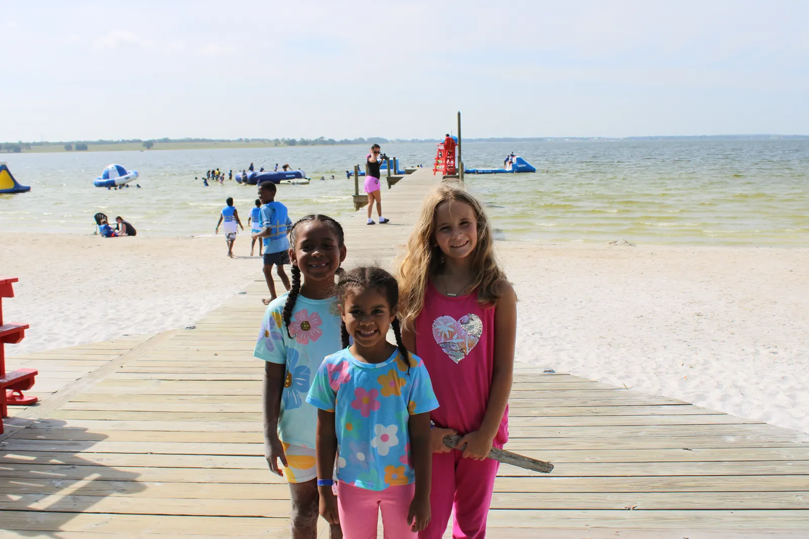 Campers on the beach boardwalk