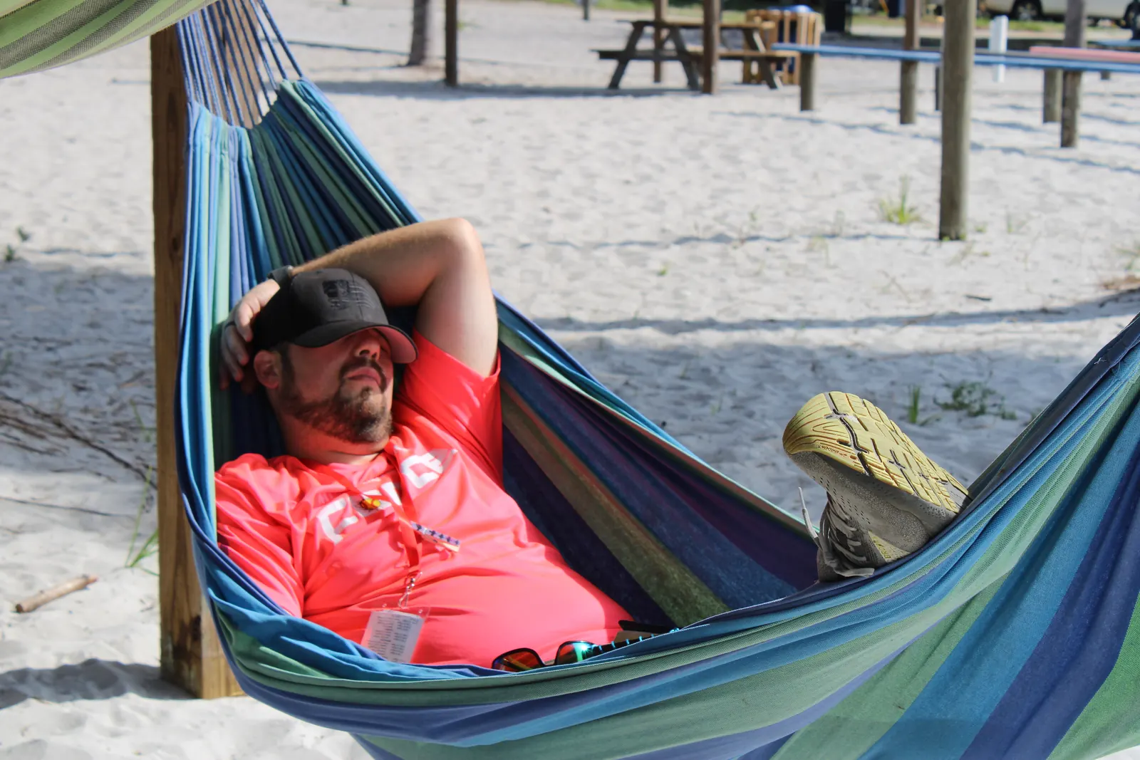 A leader taking a break in a beach hammock